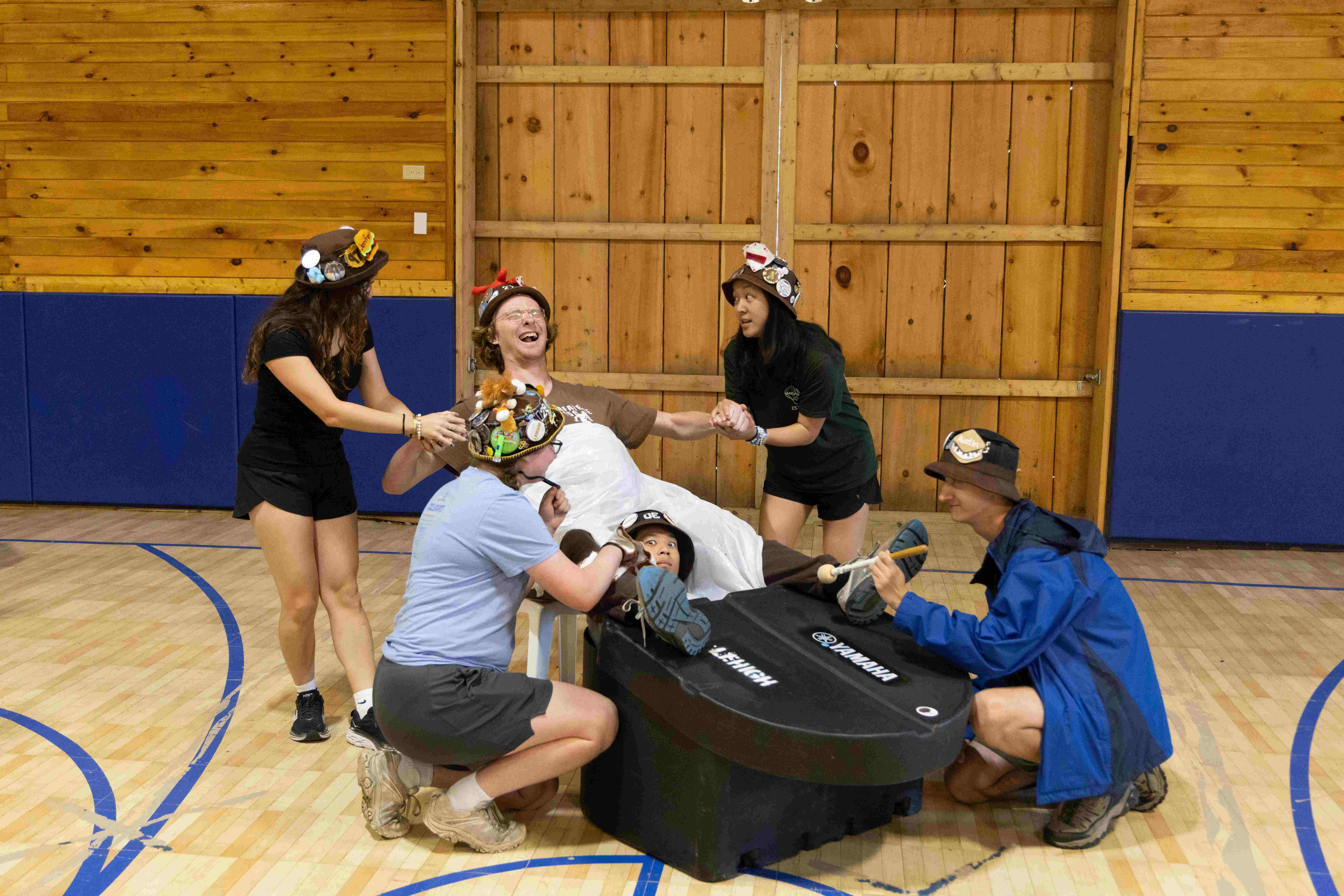 Rank 14 helping their rank leader give birth to one of their new members.
